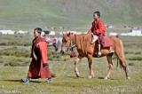 Young Monk On Horseback
