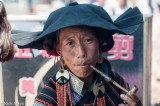 Woman From Bapu Enjoying A Pipe