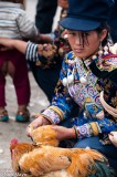 Selling Cockrels At Market