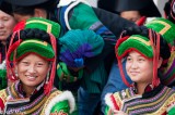 Two Girls In Green & Red Hats