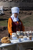Woman In An Elechek Selling Nuts