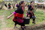 Red Hmong Women With Cooking Pot