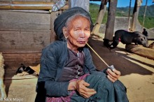 Lady Smoking Long Stemmed Pipe