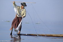 Leg Rower Fishing From His Boat 