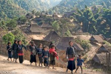 A Line Of Children In The Village