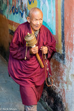 Monk With Prayer Wheel & Beads