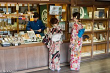 Girls In Kimonos At Temple Shop