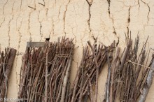 Cracked Mud Brick Wall With Wood