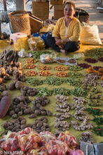 Market Vendor With Her Produce