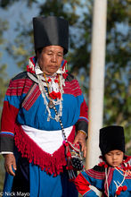 Woman With Child At The Festival