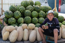 Young Boy Selling Melons