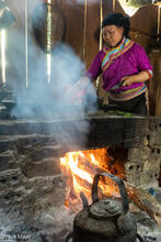 Xa Phang Woman At Her Stove