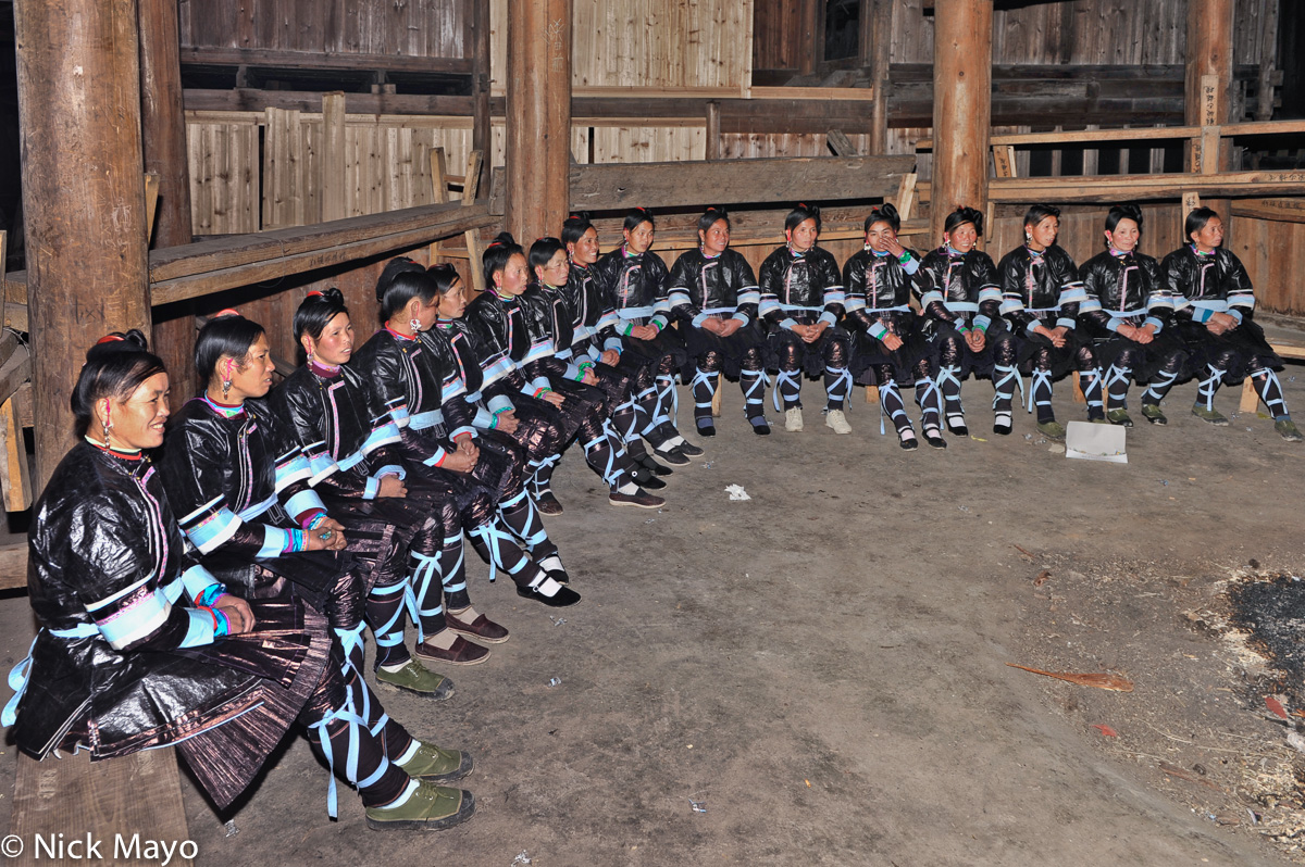 A ladies' Da Ge Ensemble singing at a Dong festival in Xioahuang.