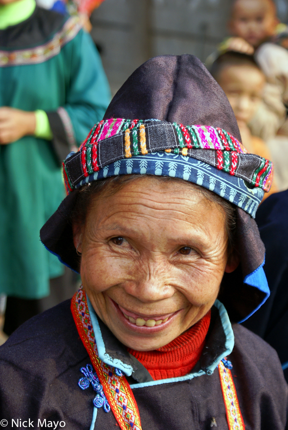 A Miao woman wearing a traditional hat in Sandu.