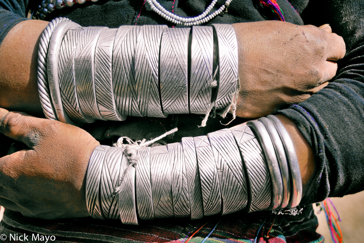 Traditional Eng bracelets worn by a woman from Ban Nong village.