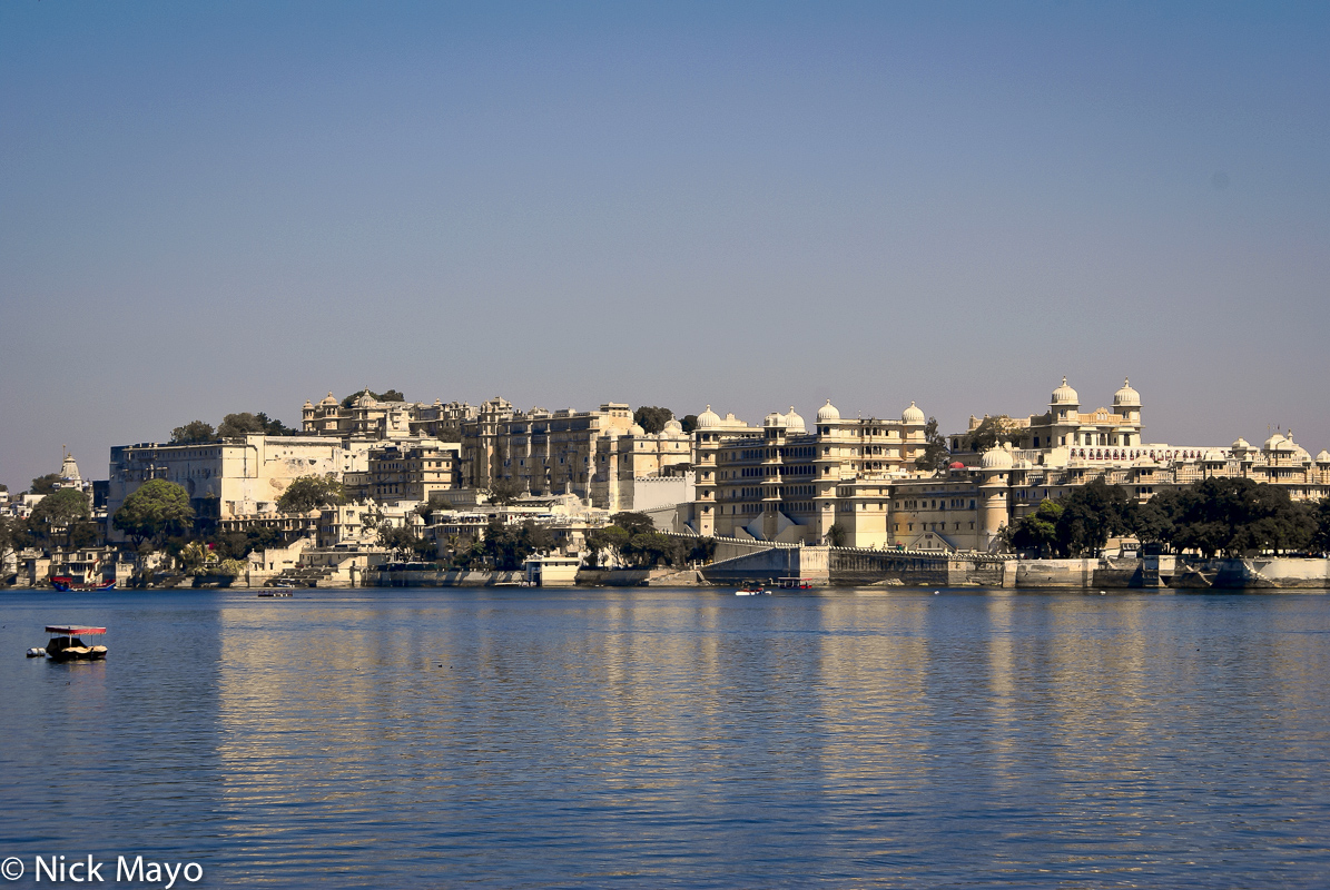 A view of the Udaipur City Palace from Pichola Lake.