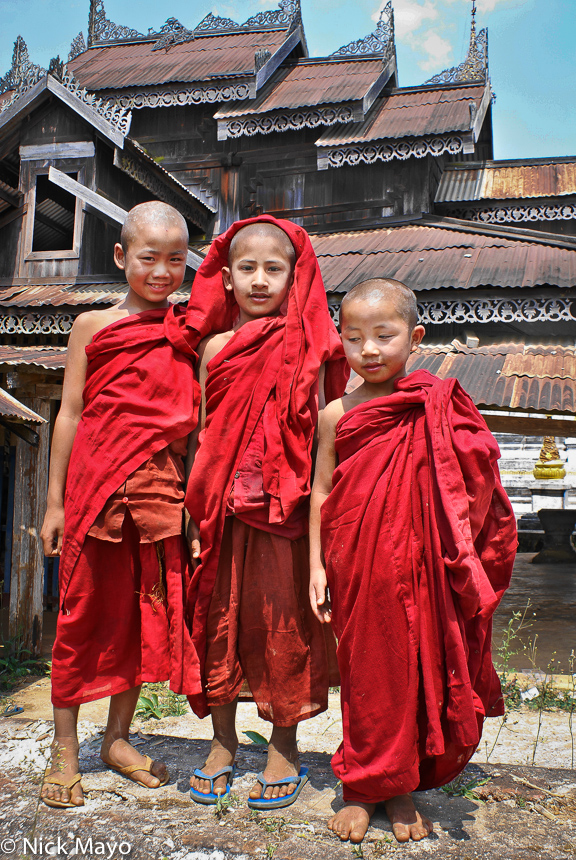 Three young monks at a monastery outside outside Kyaukme.