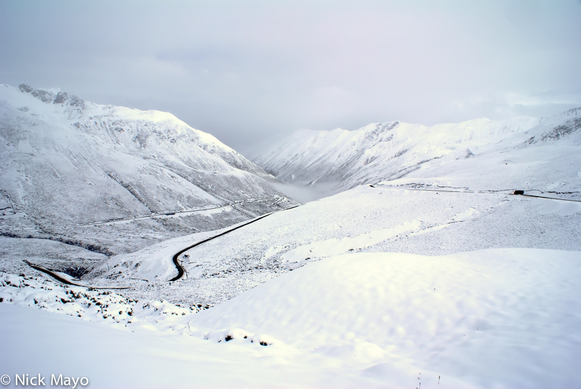 Summer snow in the valley leading to the pass on the road above Karpo.