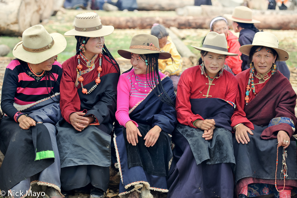 Five Tibetan women with braided hair at a festival at the Yazer Gon monastery in Manigango.