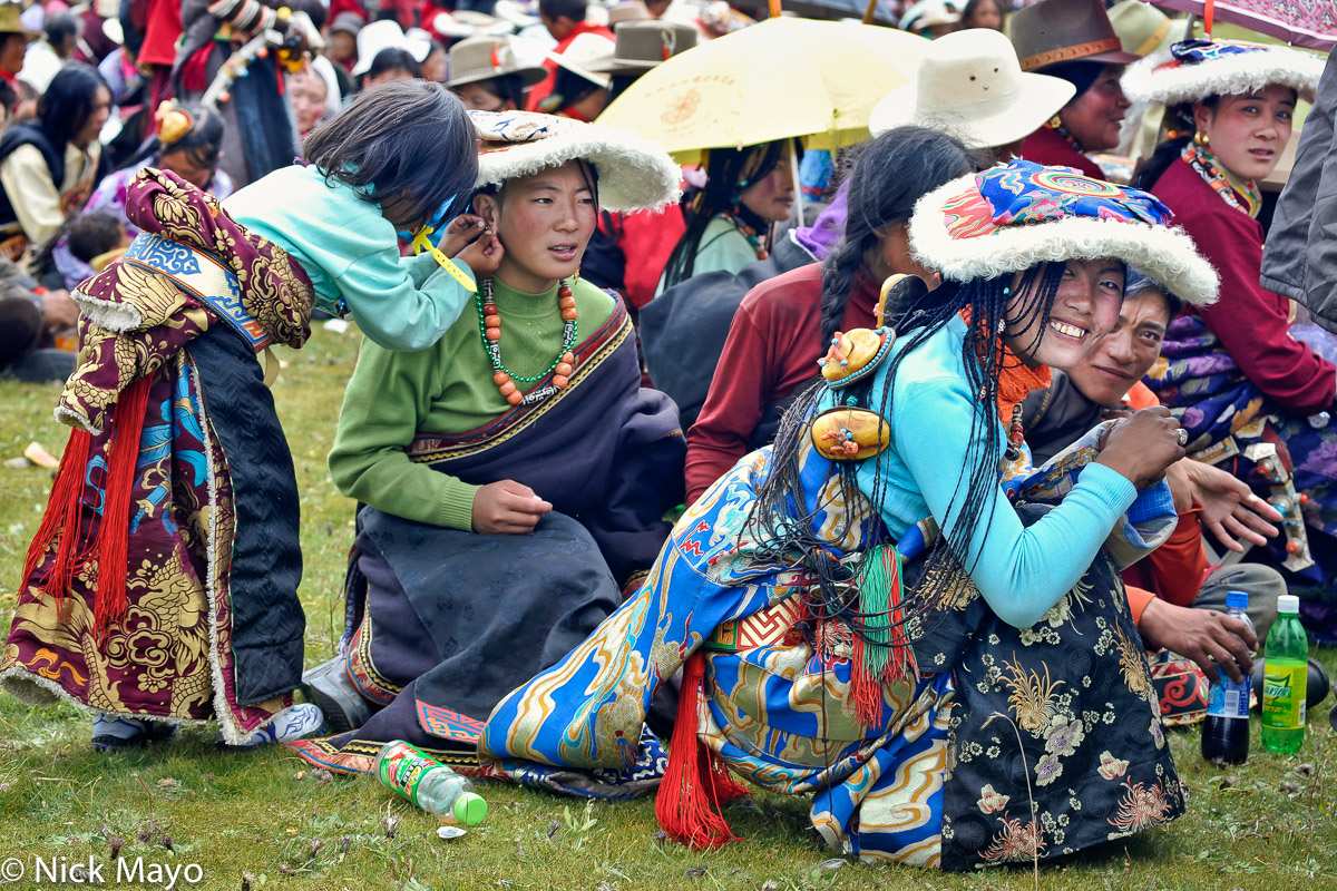 Tibetan women in festival finery at a horse festival in Sershul.