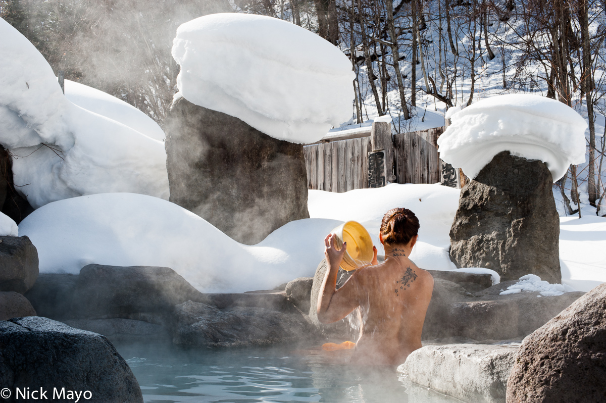 Bathing at a rotenburo at Okukinu onsen.