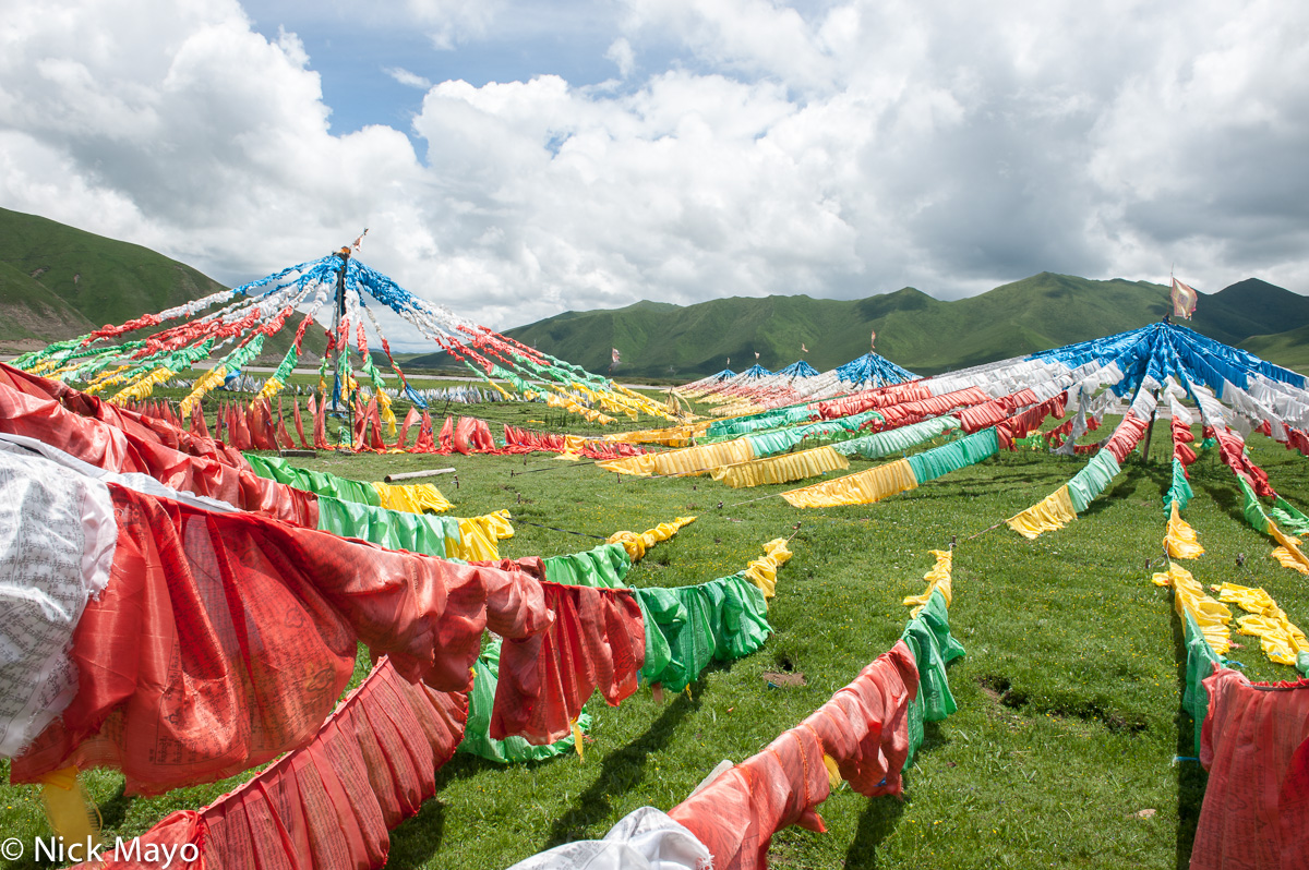 Prayer flags on the grassland near Gyu-me.