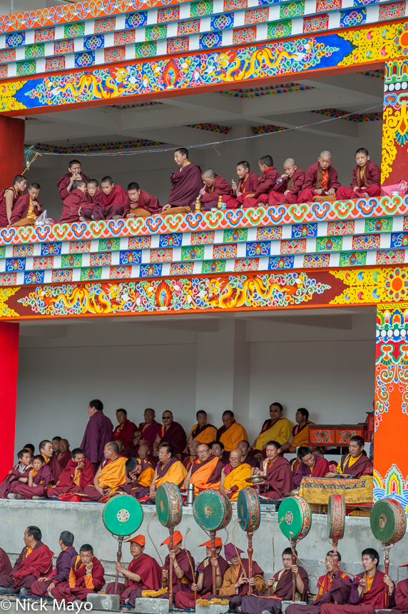 Monks, the junior ones beating drums, at a Tibetan festival at Katok.