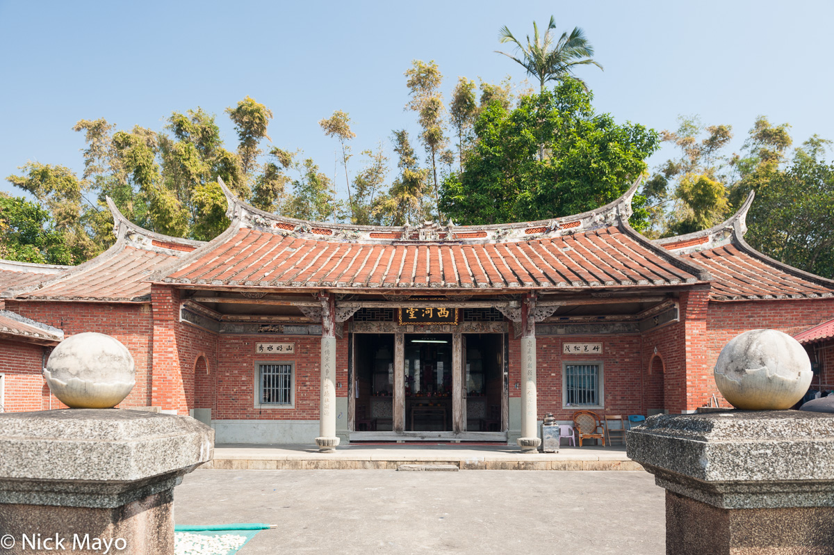 A traditional swallow tail roofed courtyard farmhouse near Xinpu.