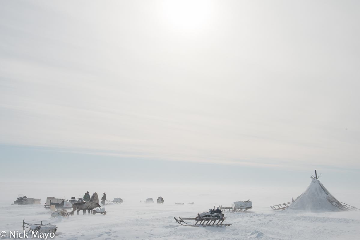 A chum and sledges in a winter camp of the Nenets people on the Yamal peninsula in the Siberian Arctic.