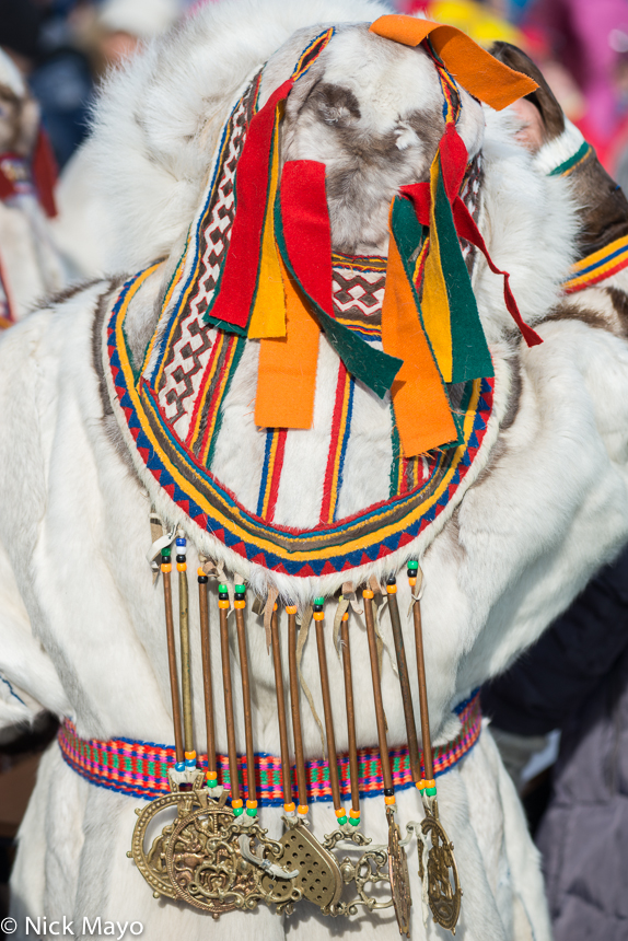 A Nenets women dressed in her best yagushka with a decorative backpiece at a festival in Yar Sale on the Yamal peninsula in the...