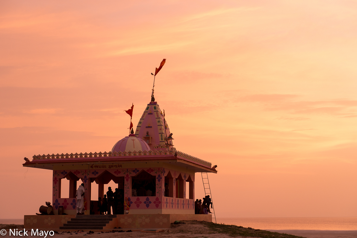 A temple at Bhanjdo on the edge of the Great Rann of Kutch at sunset.