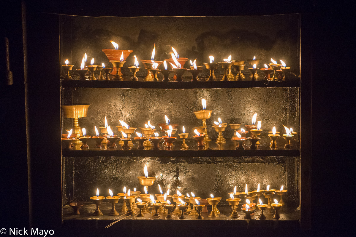 Offerings of votive candles at Swayambhunath in Kathmandu.