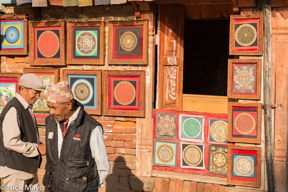 Cloth tankas for sale at a shop in Bhaktapur that also advertises Coca Cola.