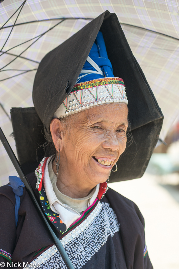 A Pa Di woman of the Tay (Zhuang) ethnic group in her distinctive hat at Muong Khuong.