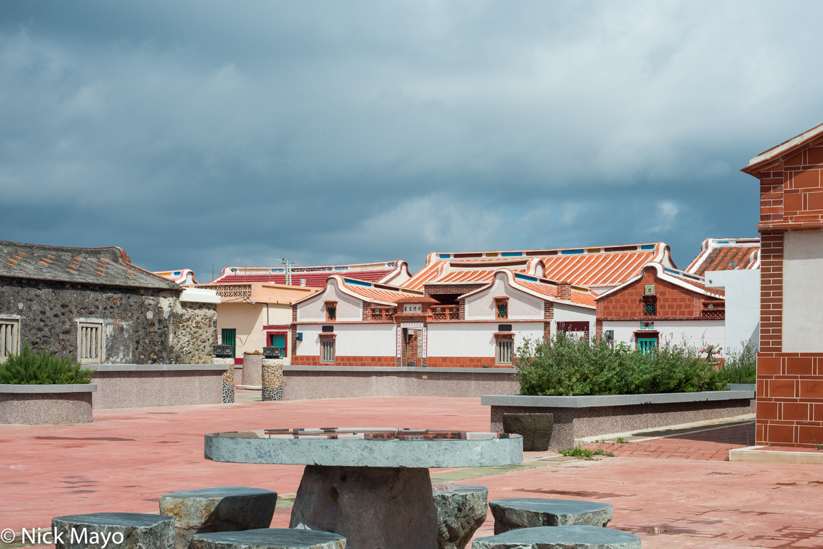 Renovated traditional houses with their distinctive roofs on the island of Chimei.