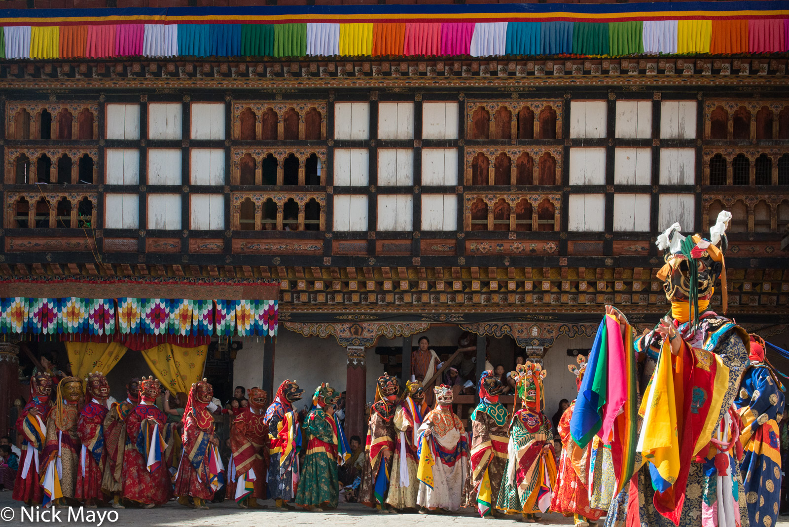 A procession of masked monks during the cham dances at Trashigang dzong.