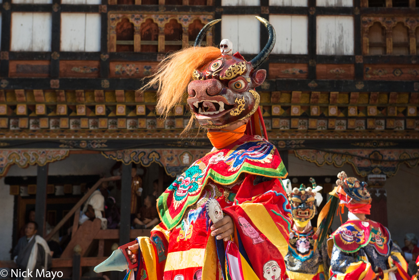 A masked monk dancing during the Trashigang tshechu.