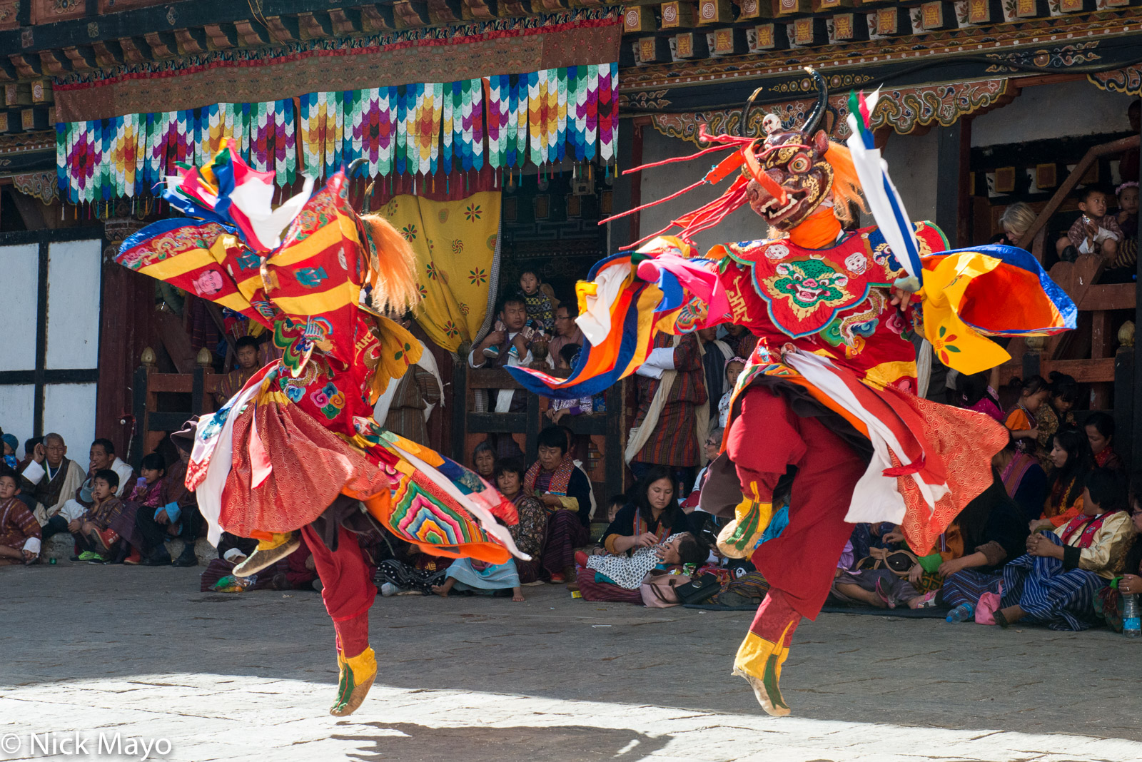 Masked monks dancing during the annual tshechu at Trashigang dzong.