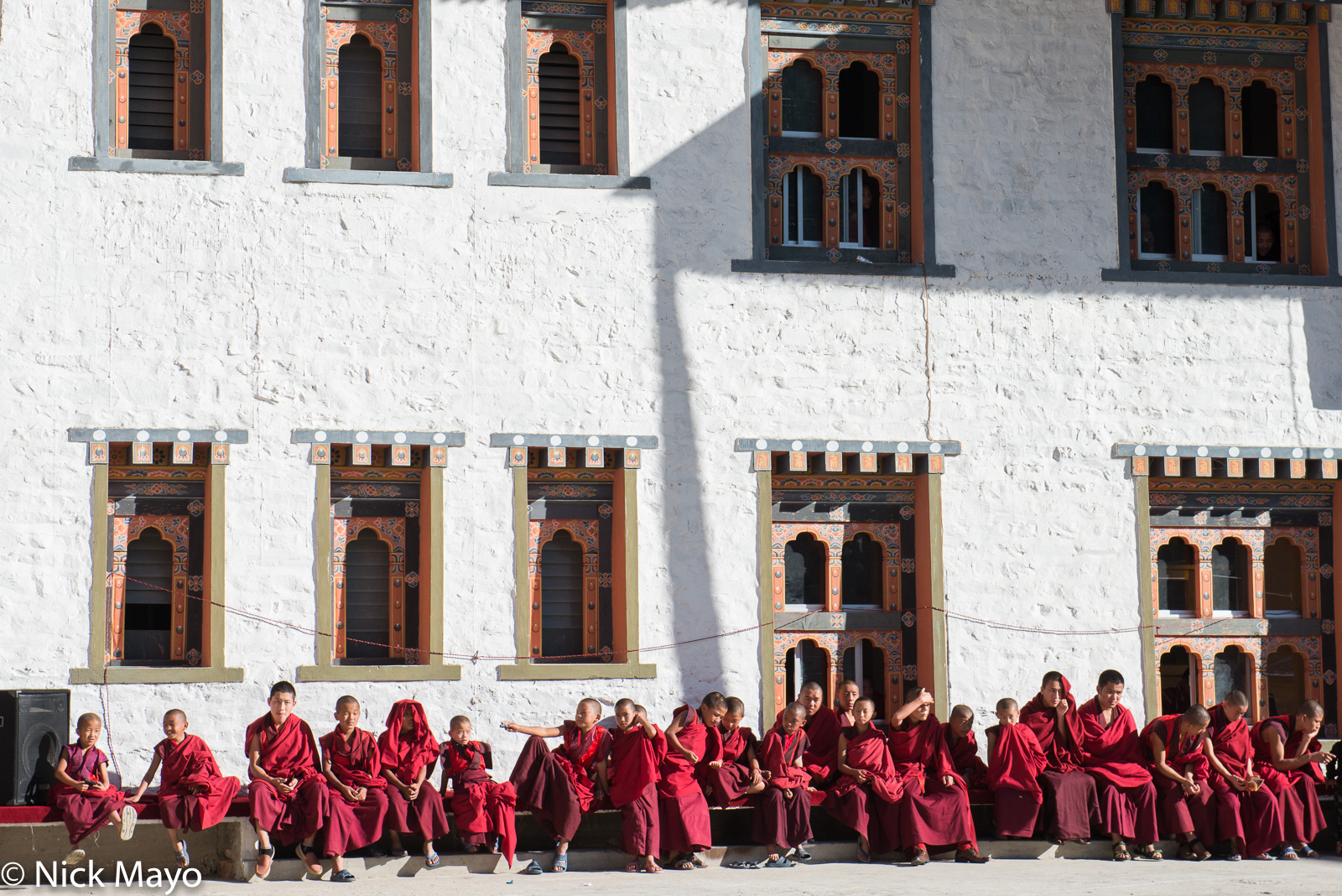 Young monks gathered in the courtyard of the Mongar dzong for the tshechu dances.