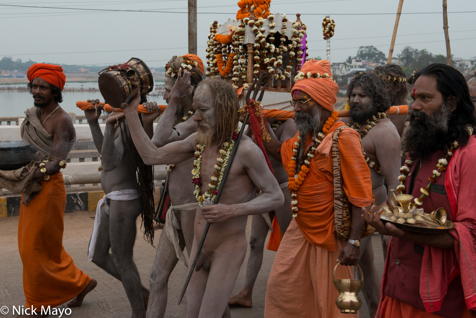 Naga sadhus accompanying the god during the Shivaratri festival procession at Rajim.