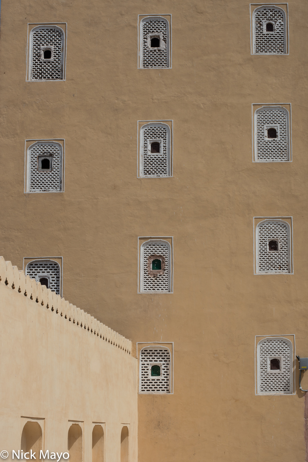 A tower with latticed windows at the Hawa Mahal in Jaipur.