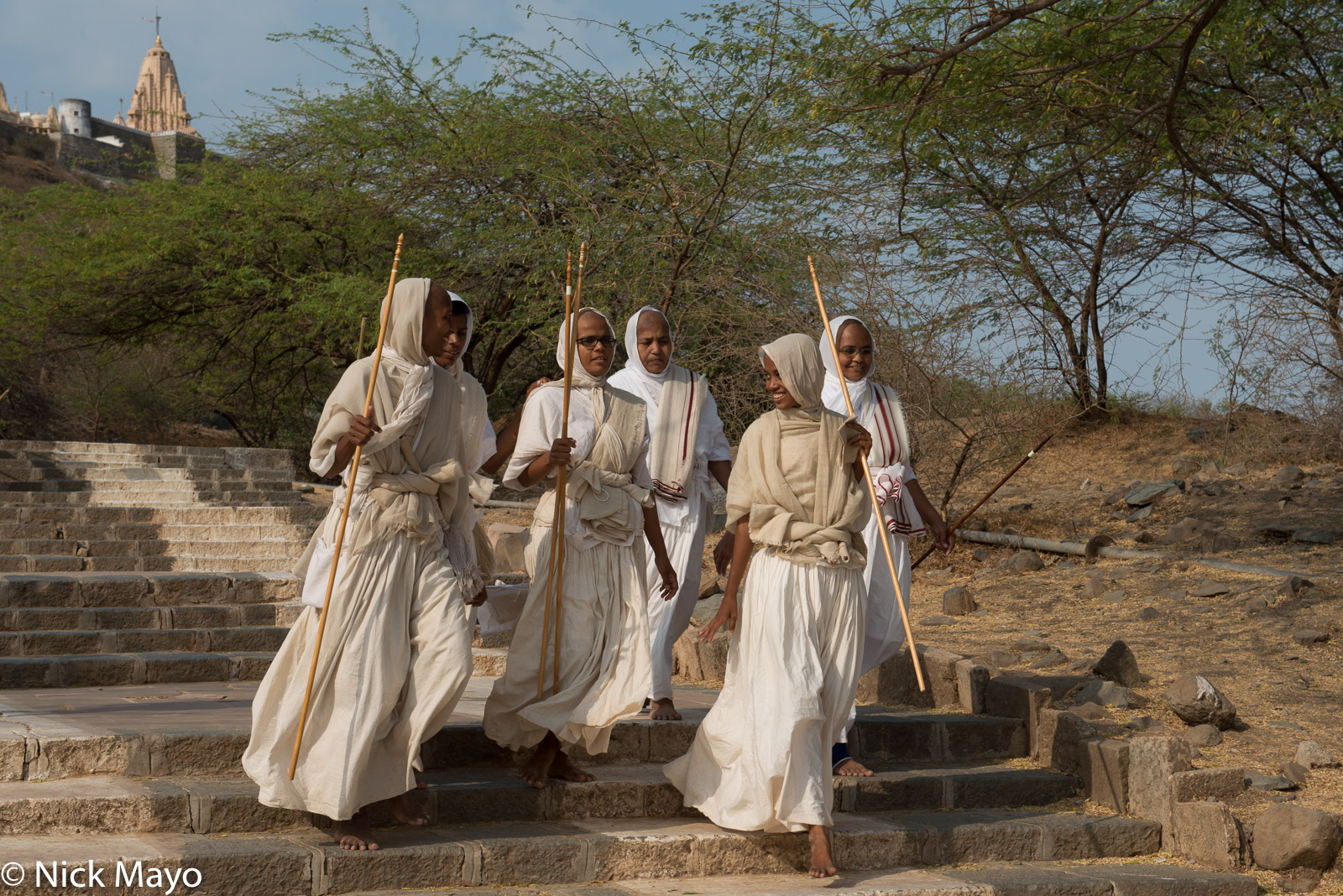 A group of Jain nuns descending from the Shatrunjaya Hill temple complex at Palitana.