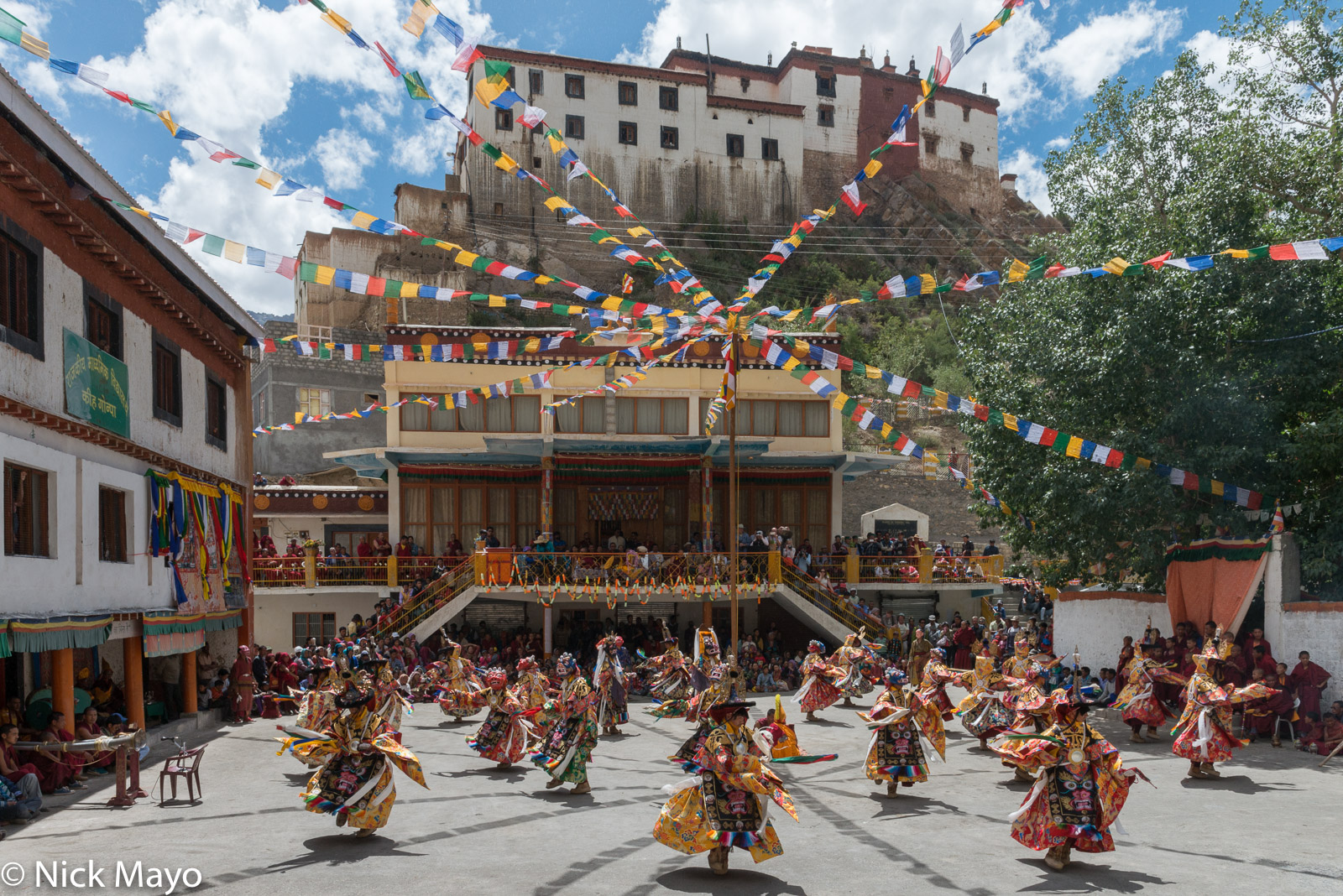 Monks dancing during the annual festival held in the monastery courtyard at Ki.