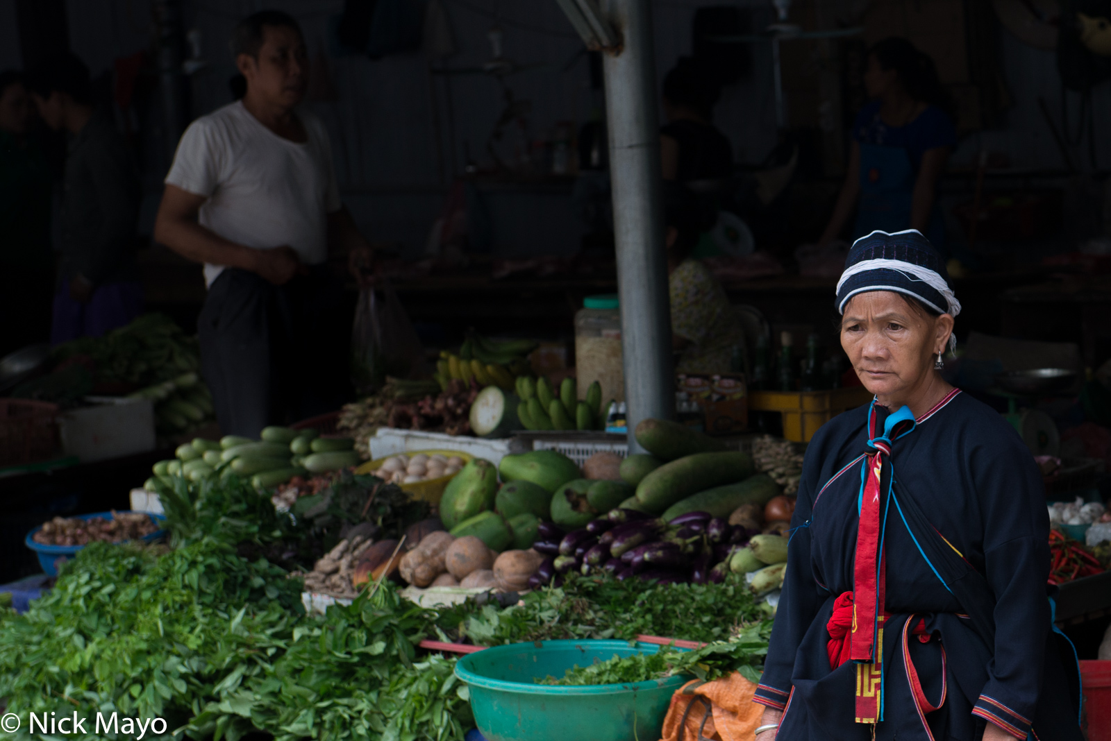 A Dao Ao Dai woman at the Sunday market in Su Phi.