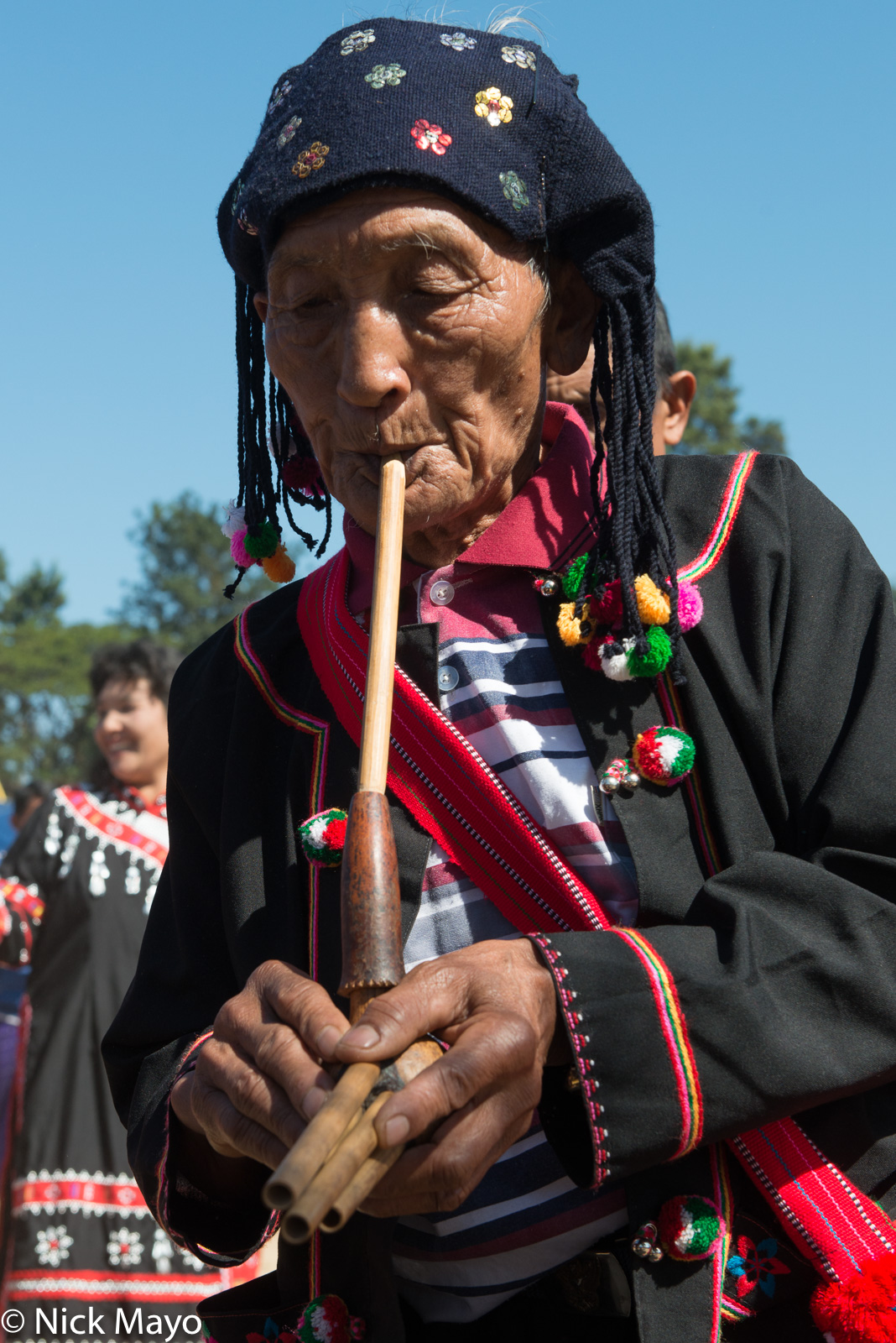 A Black Lahu piper at his New Year festival in Kengtung.