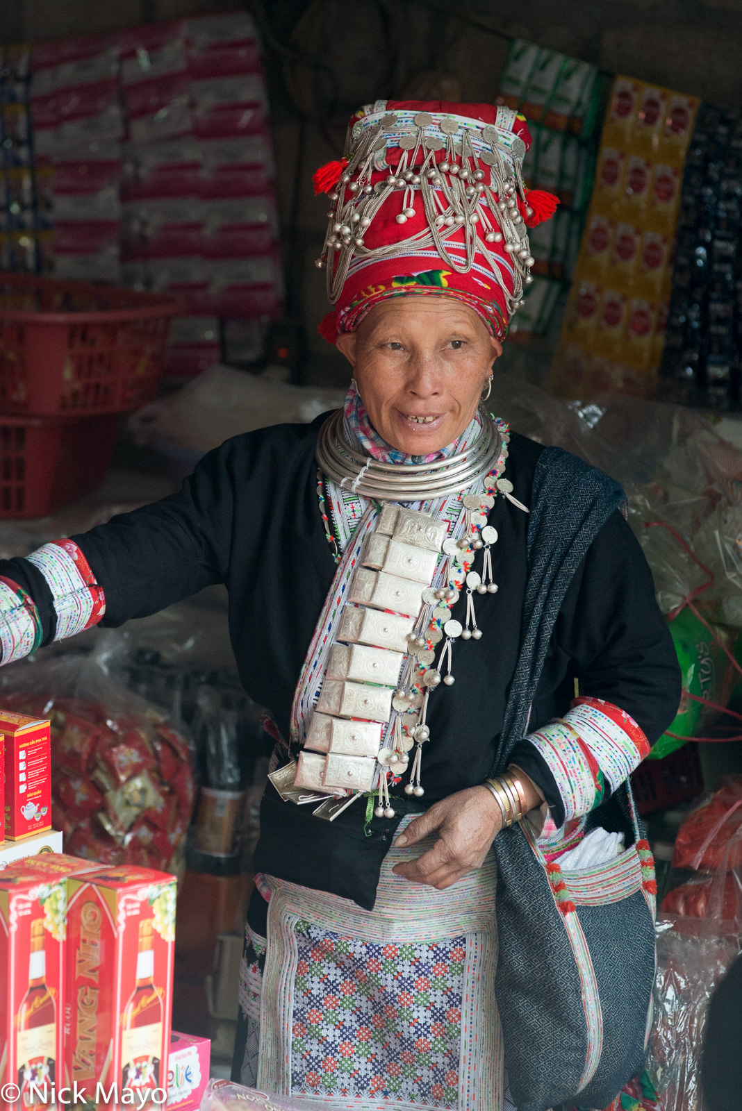 A Red Dao woman shopping at the New Year market at Muong Hum.
