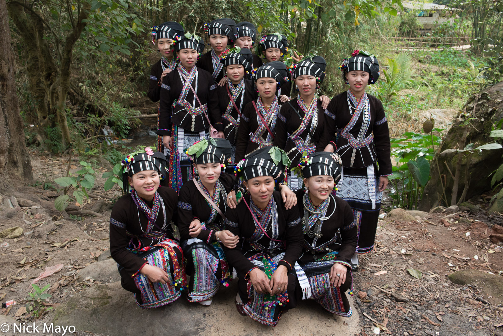 Lu girls posing for a group photograph at a New Year festival in the Nam Ma valley.