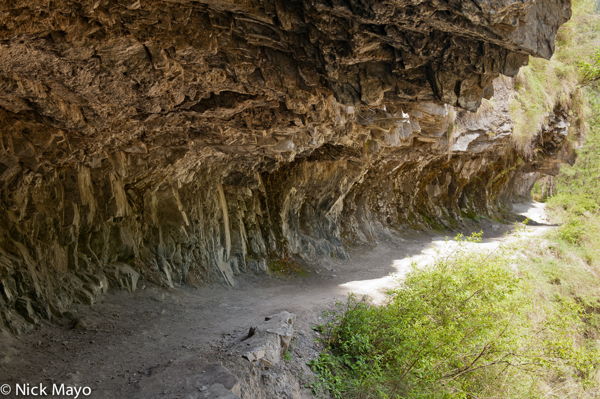 A trail hewn out of rock along the Nu river at Cho Na Tung.