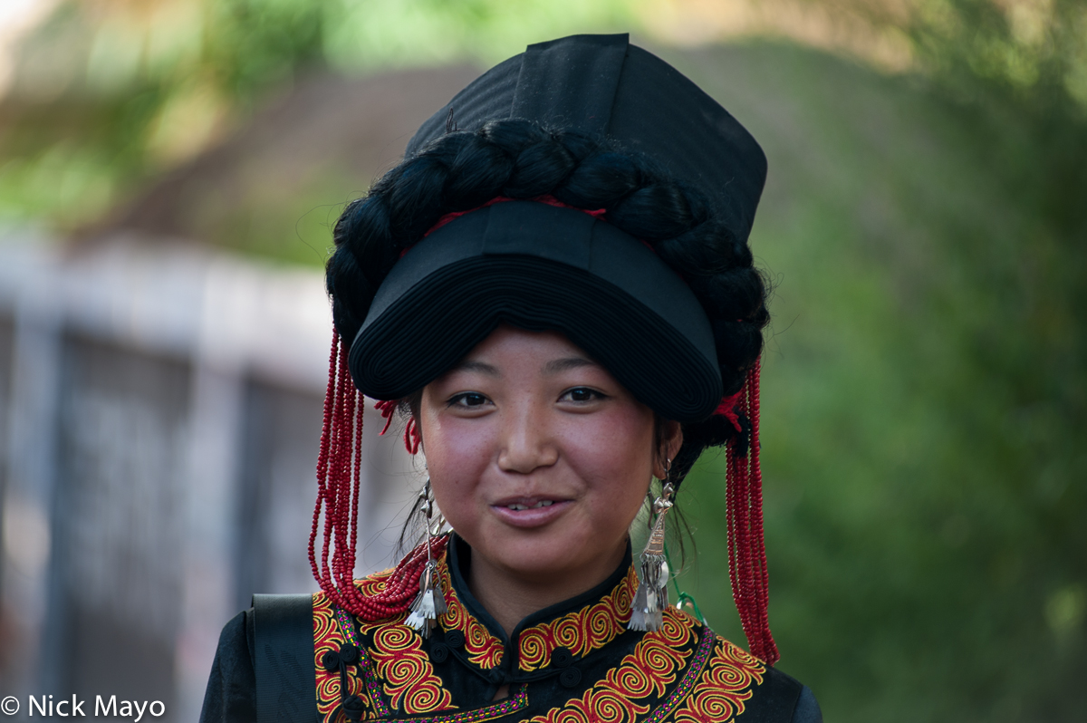 A Yi woman at a festival in the Daliangshan village of Hubo Luo.