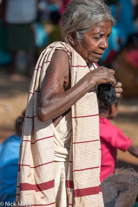 A Botra woman of the Gond ethnicity in traditional dress at Madum market.